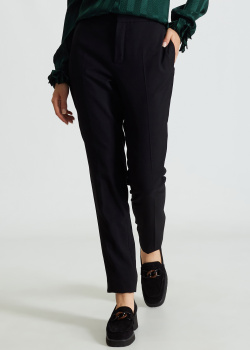 Шерстяные брюки Saint Laurent черного цвета, фото